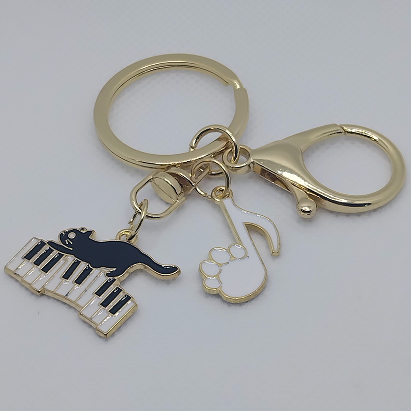 Cat Climbing Piano Keys