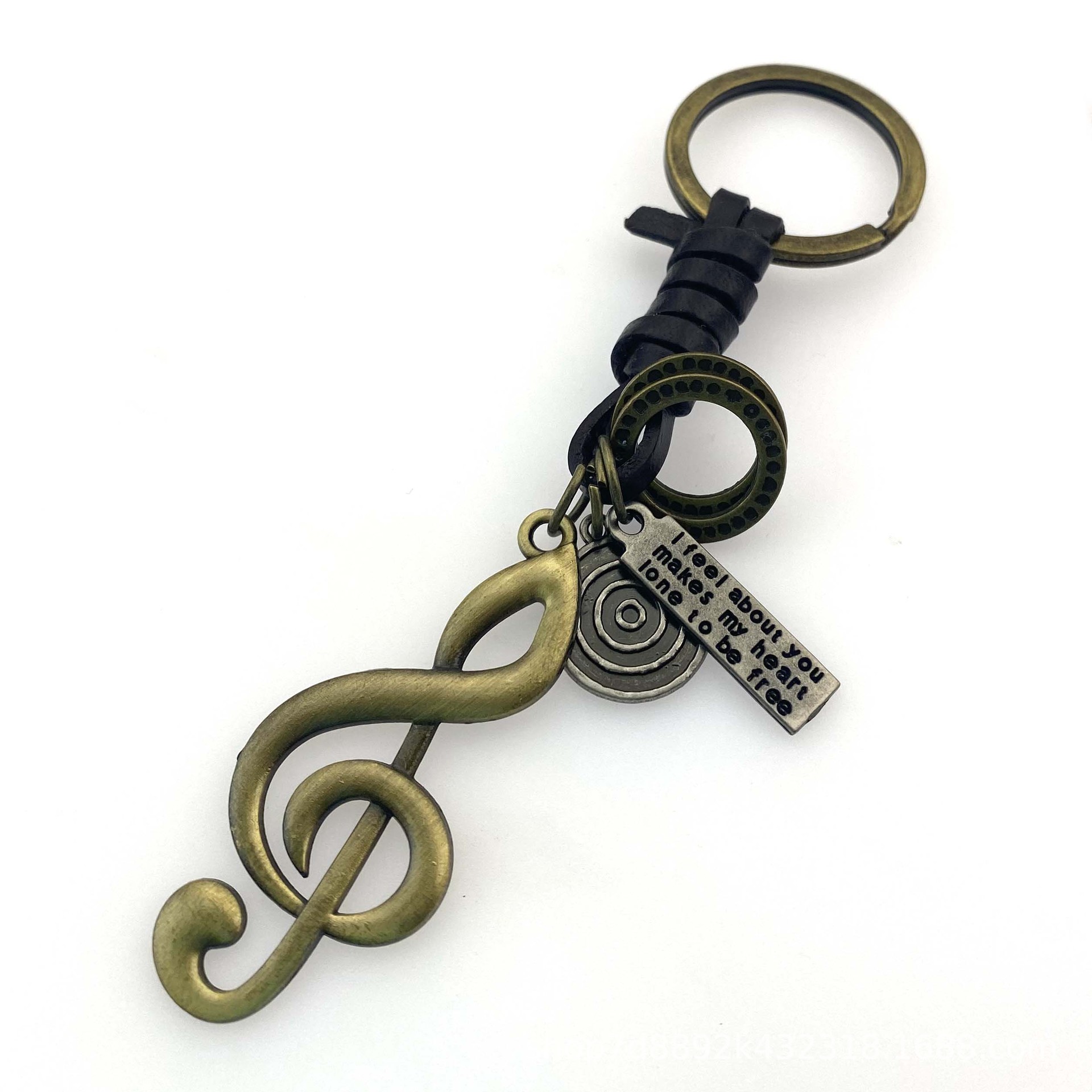 Leather-Wrapped Treble Clef Keychain – Antique Brass Finish